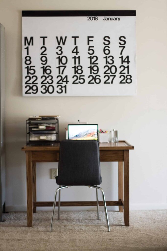 Calendar above a desk