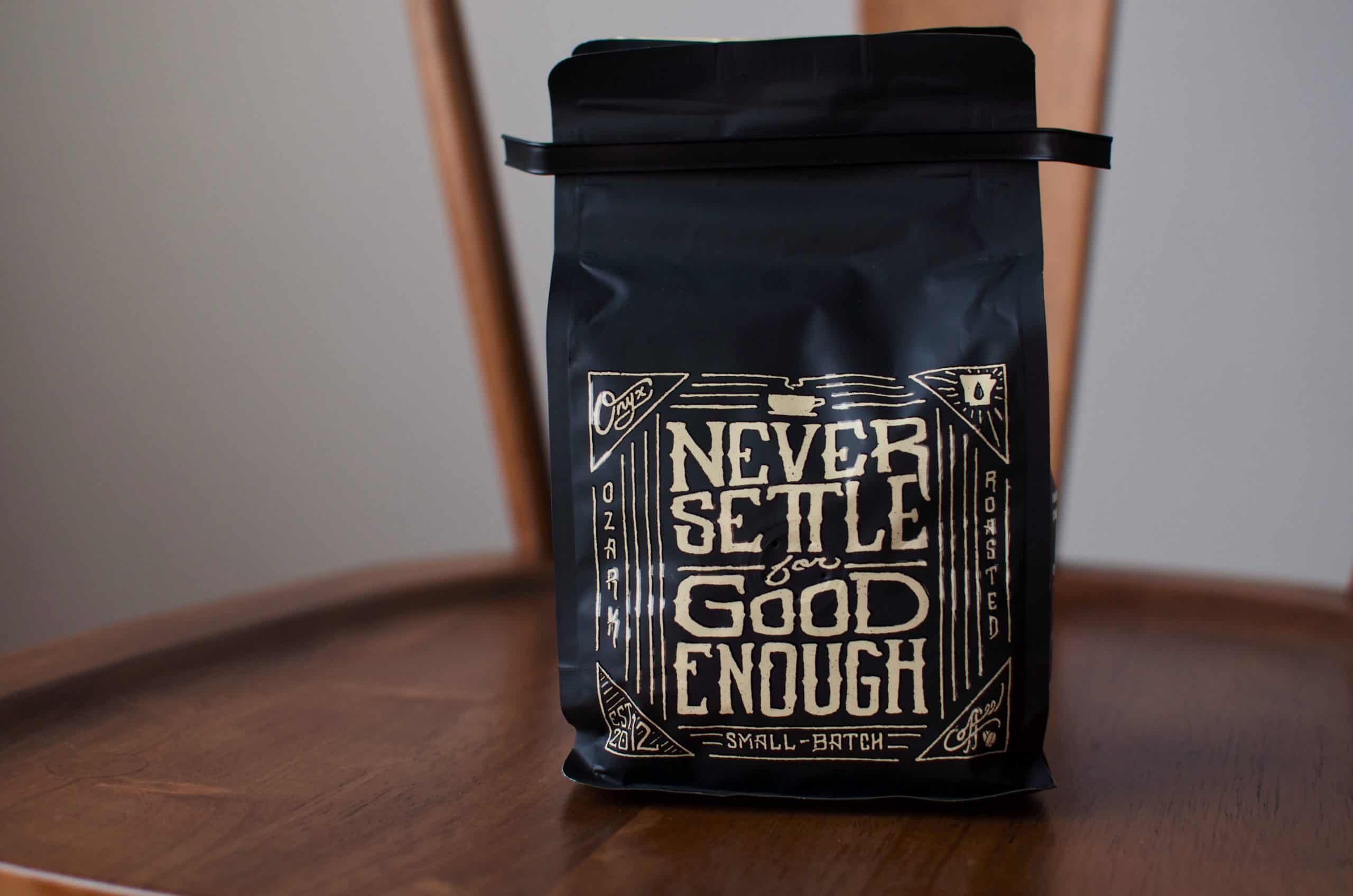 Black Coffee bag with gold lettering and designs