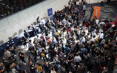 Crowd of people in building lobby