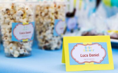 baby shower name and popcorn in a cup